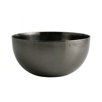 Black bowl with 'BEHR & CO' branding on a white background