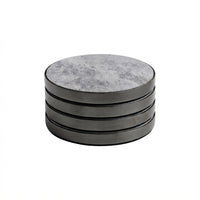 A stack of four round coasters with a gray marbled top surface and dark gray metallic sides, shown on a plain white background.