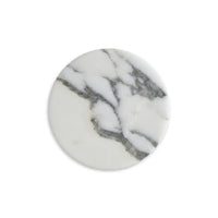 Round marble trivet with gray and white pattern on a white background