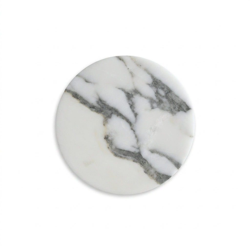 Round marble trivet with gray and white pattern on a white background