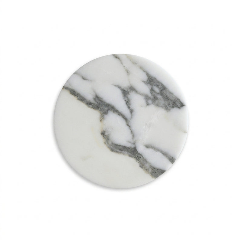 Round marble trivet with gray and white pattern on a white background